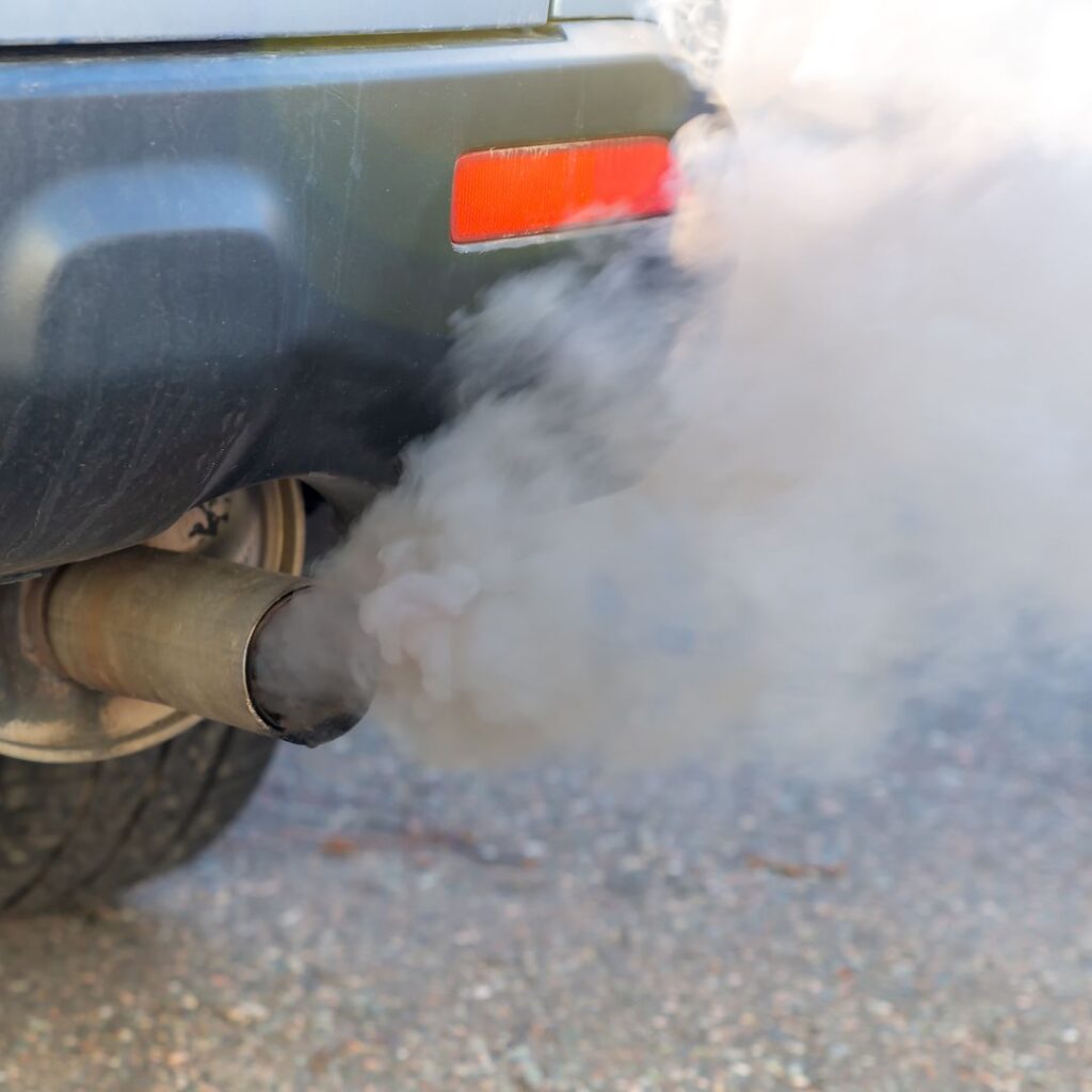 Smoke from your exhaust.
